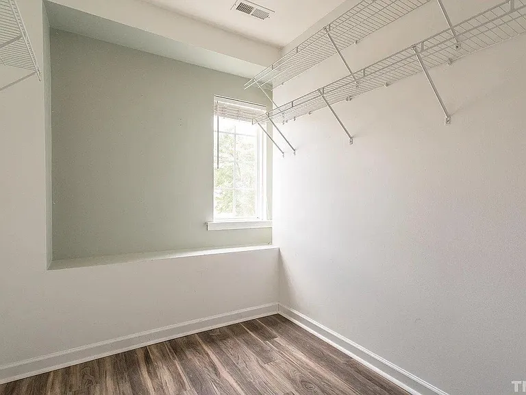 Walk in closet in master bedroom