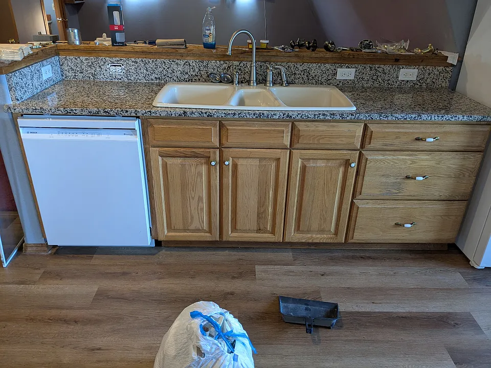 (excuse cleanliness, we are still renovating!) 
brand new stainless steel dishwasher, triple sink, granite countertops