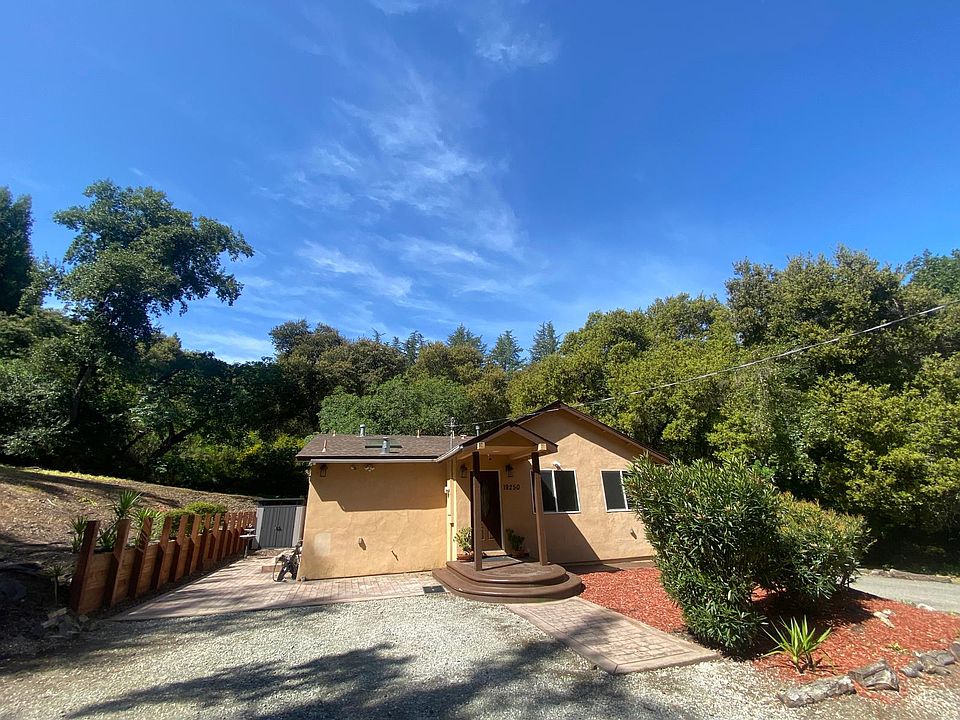 Welcome to your private Los Gatos retreat on over 2 acres of serene, tree-lined property