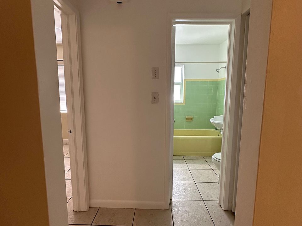 View of entrance to bedroom and bathroom