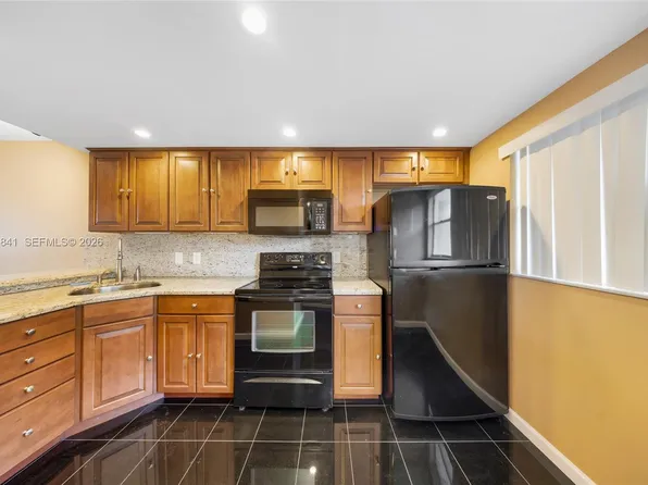 6075 N Sabal Palm Blvd APT 210, Tamarac, FL 33319