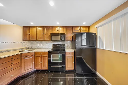 6075 N Sabal Palm Blvd #210 Photo 1