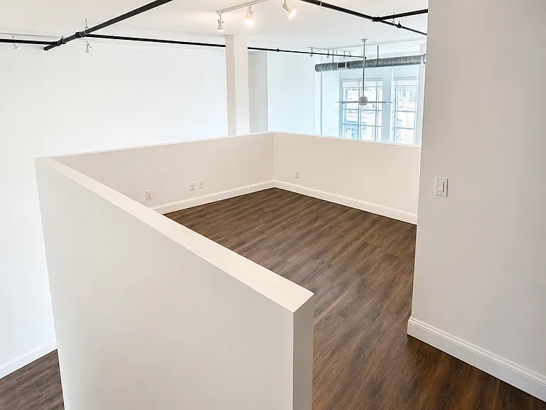 Versatile loft ideal as a home office, media room, or optional third sleeping area.