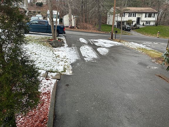 Pawed parking lot is large enough for 5 cars.