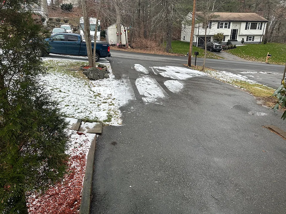 Pawed parking lot is large enough for 5 cars.