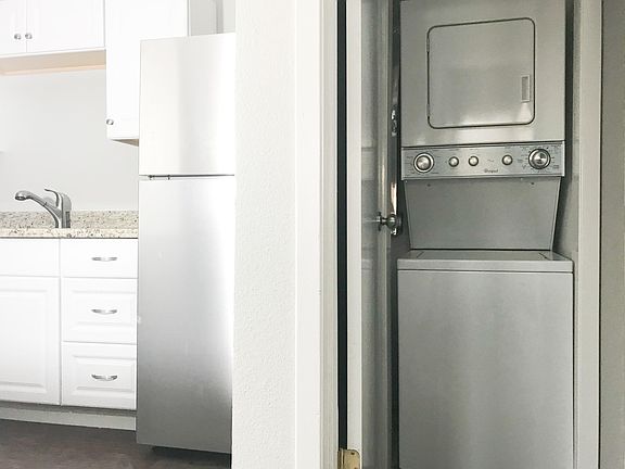 Stackable Washer & Dryer in Each Unit