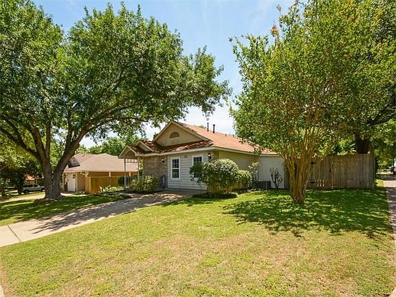 Extra green space with this coveted corner lot.