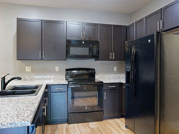 Cook and connect in our modern kitchens with granite countertops, sleek cabinetry, and plenty of room for meal preparation.