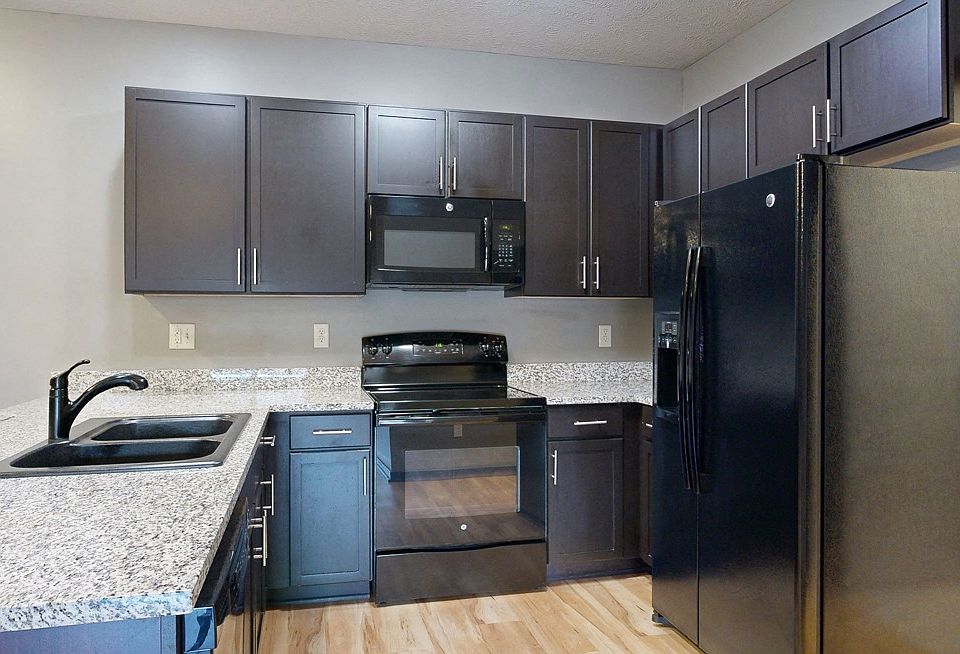 Cook and connect in our modern kitchens with granite countertops, sleek cabinetry, and plenty of room for meal preparation.