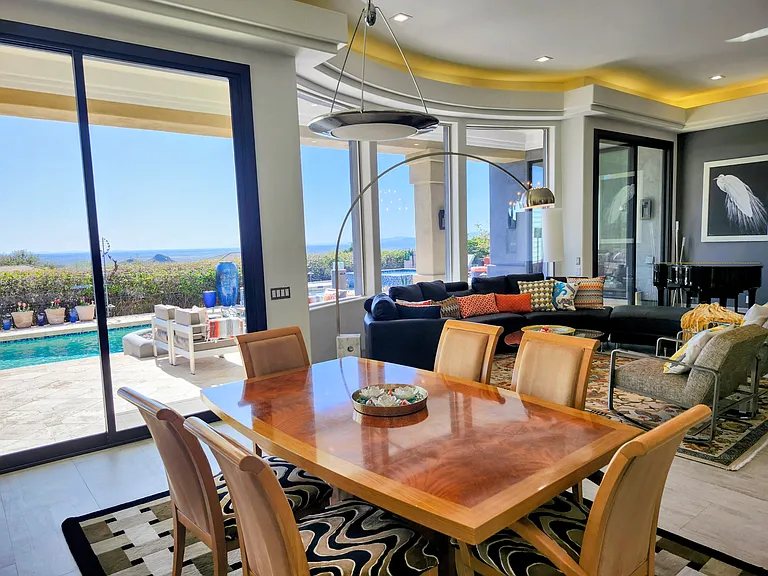 13ft ceilings and stacking 10 ft doors blur the lines between inside and alfresco