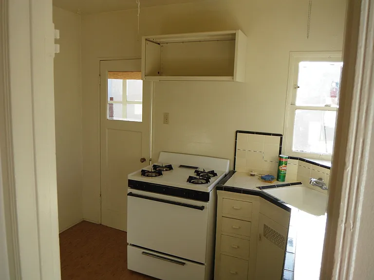 Kitchen with door to service porch closed