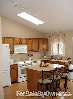 Kitchen
						:
						new Frigidaire appliances, pull up bar island, vaulted ceilings, skylights