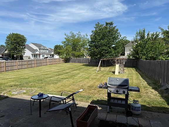 Backyard with brand new fencing and gate.