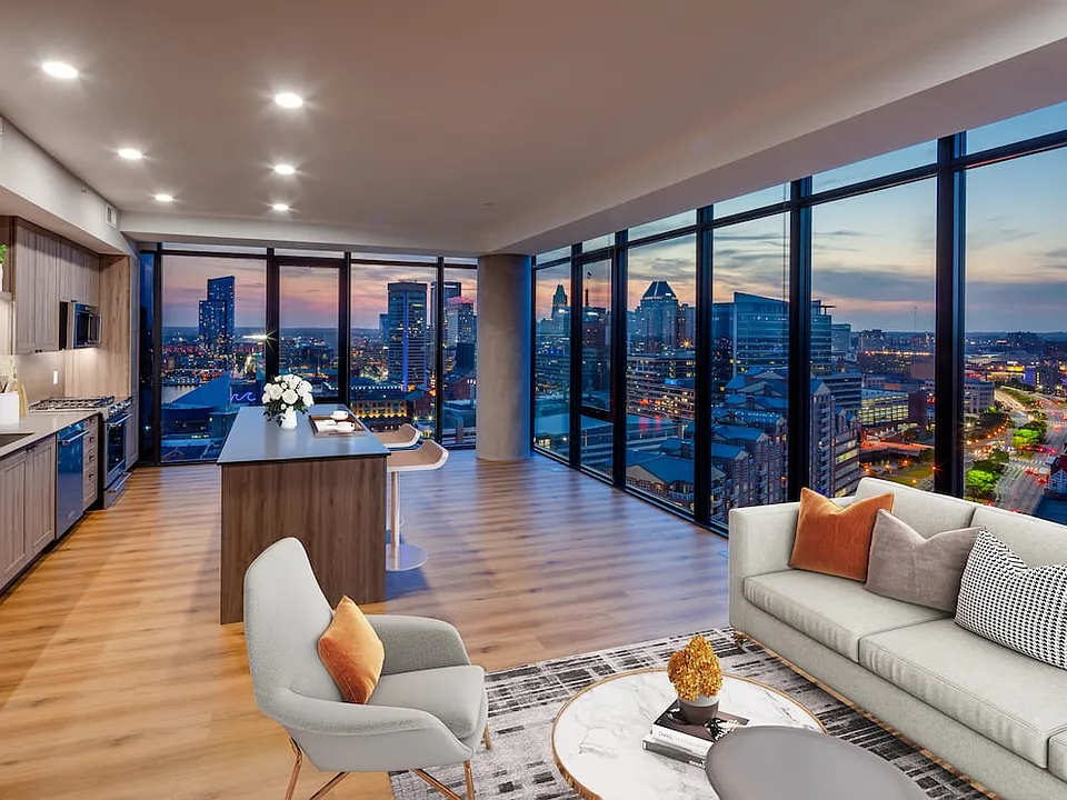 Penthouse-level Signature Collection apartment homes living/dining areas with hard surface flooring throughout