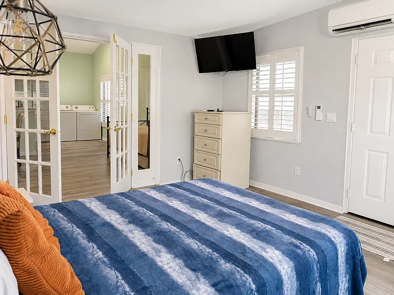 Bedroom: King bed, TV, dresser included