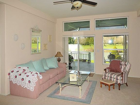 Great Room with view to deck and golf course