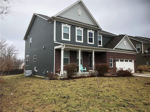 Love the covered porch and the beautiful curb appeal of this 5 bedroom home!