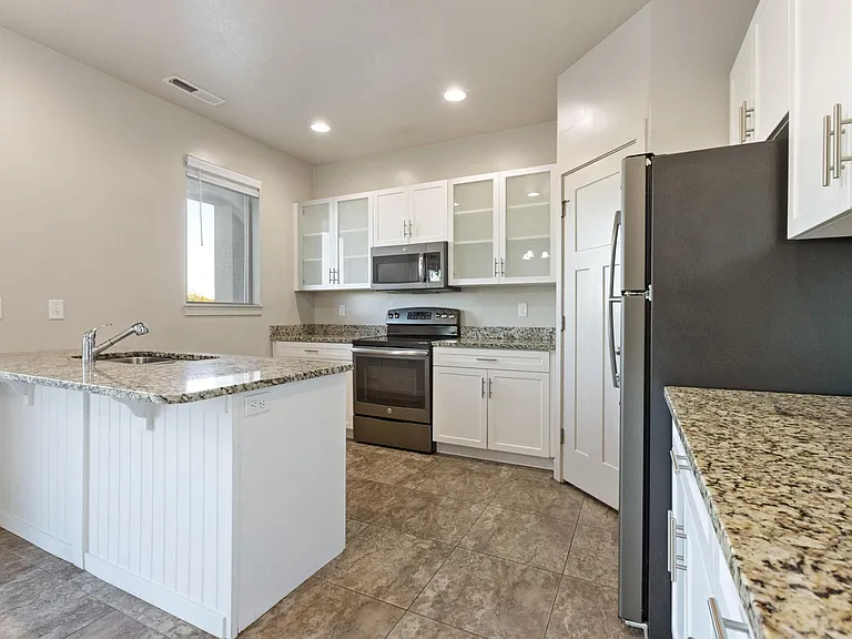 Three bedroom kitchen with lots of cabinet space