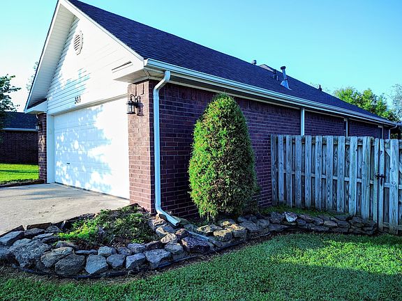 Landscaped front yard provides a nice touch