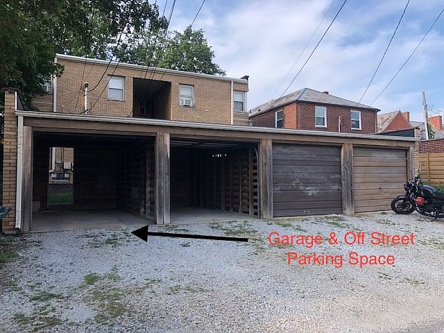 1 car Garage and 1 car off street Parking area in from of garage - Unit D space is the first garage bay on the left when looking at the garage.