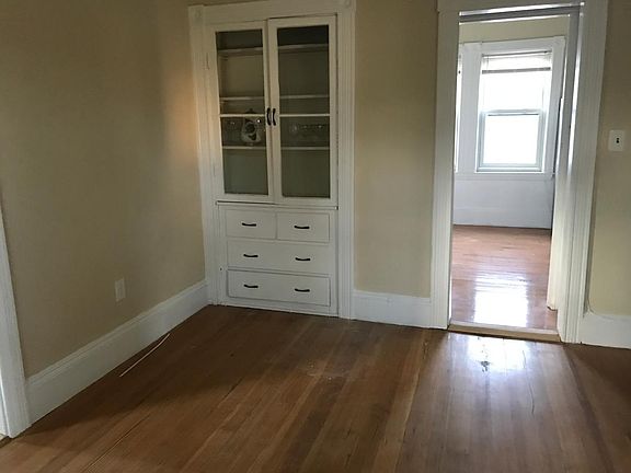 Living room with built in cabinet. 