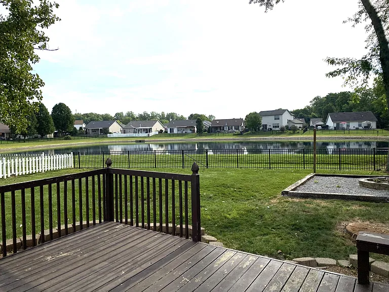 The backyard backs up to a pond