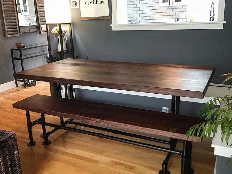 Main level dining area with custom storage banquette seating