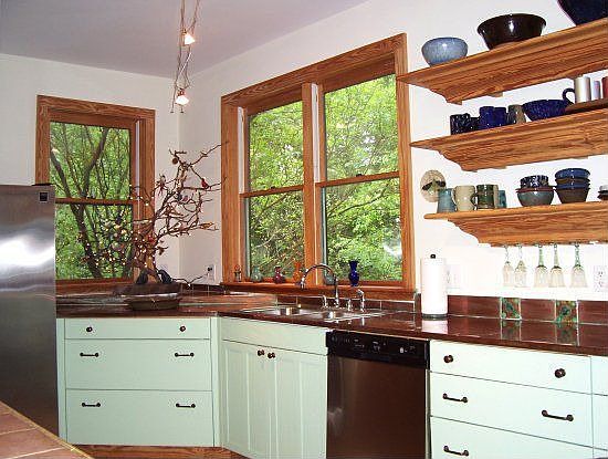 Kitchen with copper counters and custom milled shelving