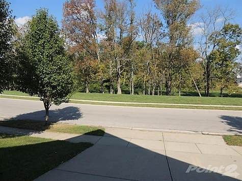 Across the street is a wetlands preserve park-like setting