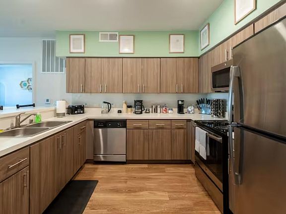 Experience the joy of cooking in our fully equipped kitchens! Designed with the home chef in mind, these kitchens come complete with top-of-the-line appliances, ample counter space, and all the cookware and utensils you need to create delicious meals.