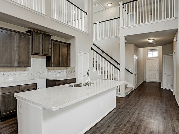 Kitchen located off the foyer