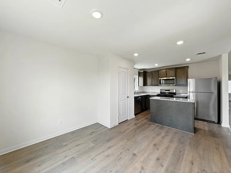 The dining room of sits right off of the kitchen.