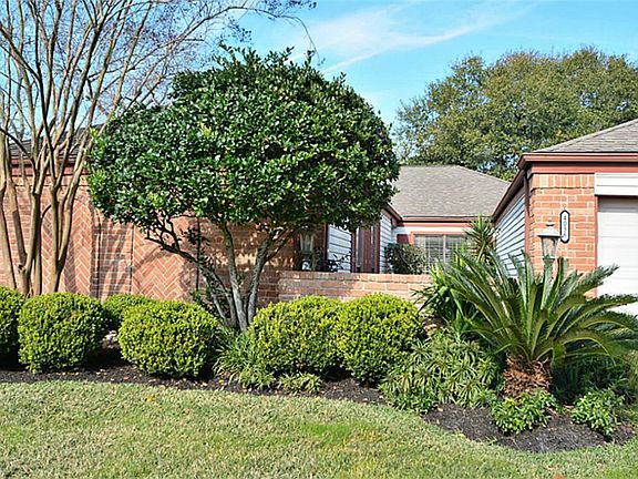 Wonderful Front Courtyard!  Siding that does not rot, needs painting as carefree as it gets!   Gorgeous Entrance to come home too