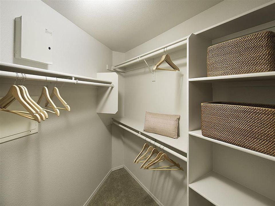 Built-in shelving in our walk-in closets give you lots of st