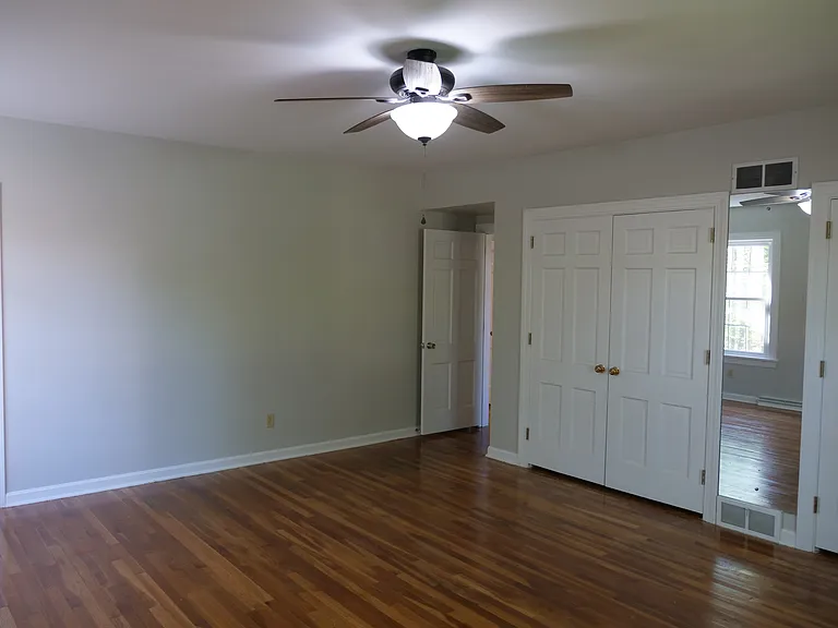 Master bedroom with attached full bathroom.