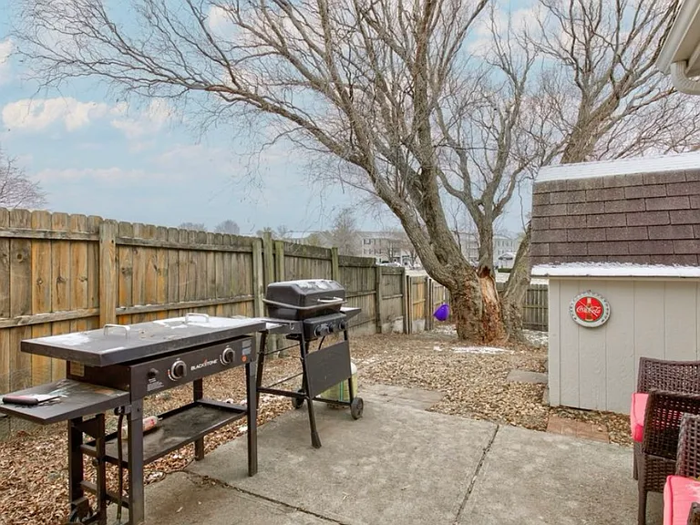 Fully fenced backyard with plenty of room to relax or play.