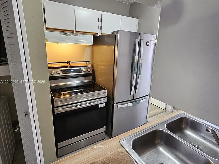 18306 NW 68th Ave #H — Photo 3