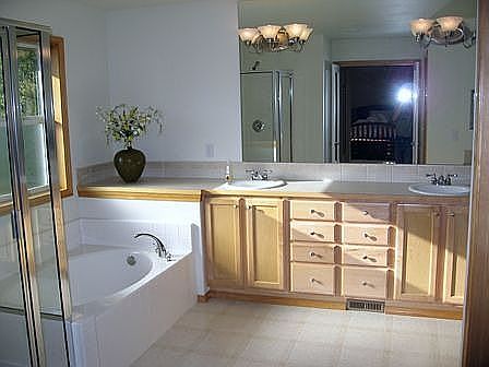 Master bath with vanity seating area