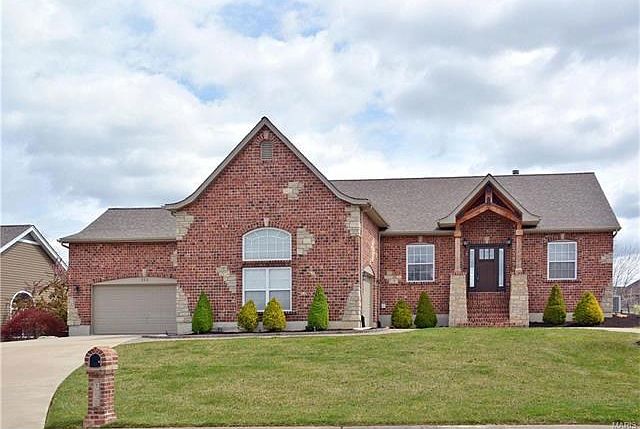 stunning Brick/Stone front exterior. Nicely landscaped for great curb appeal plus 3 car oversized garage with circle drive.