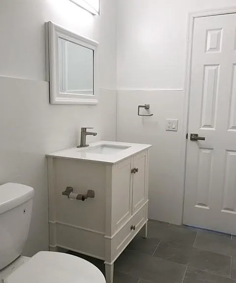 Bathroom, new light fixtures, new cabinets