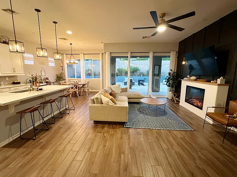 Open floor plan with 3 panel sliding door.