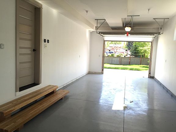 Pull through garage with sliding gate on I Street