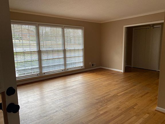 Living room attached to kitchen and dining room
