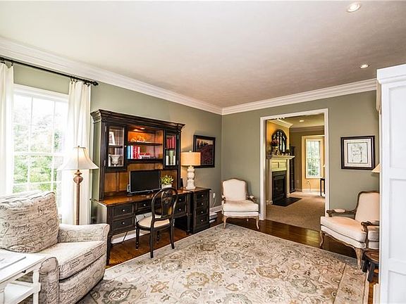 Enjoy gorgeous hardwood floors and natural decor in the 15 x 12 living room located off of your front entry.