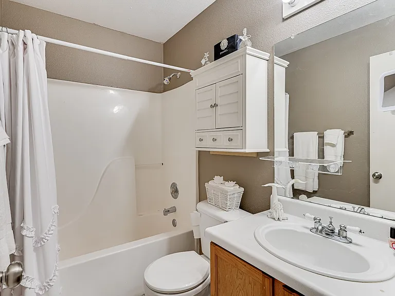 Spacious and bright bathroom for convenience and comfort.