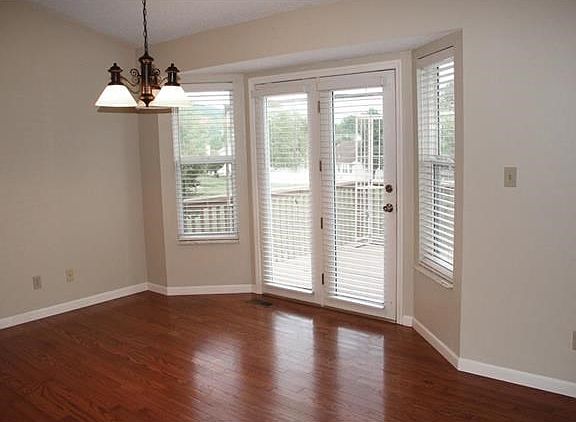 Bay window with atrium door in dining area