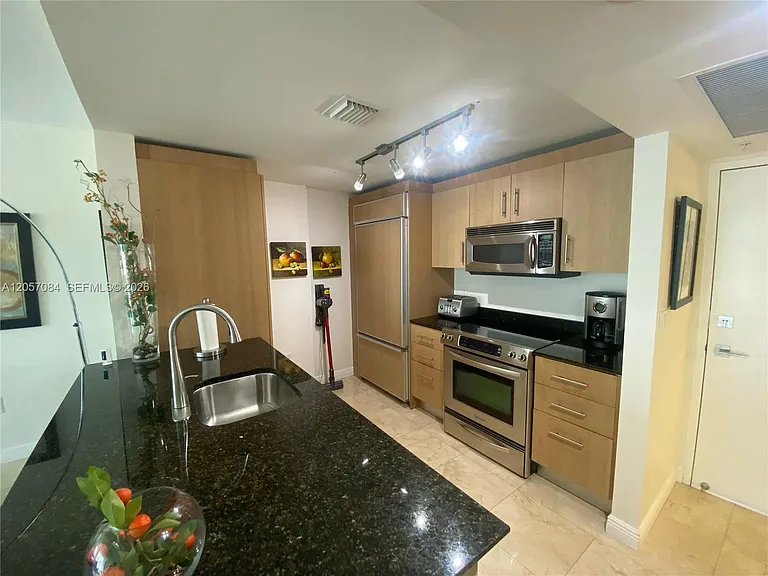 10275 Collins Ave #215 — Photo 7