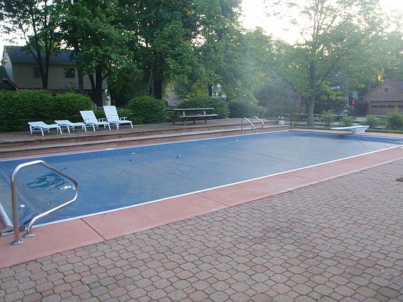 Safety auto-covered pool, patio, and deck for entertaining 