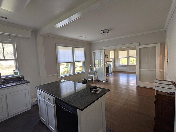 Kitchen looking to Living room