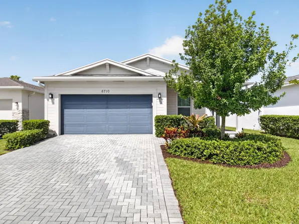 6710 POINTE OF WOODS Drive, West Palm Beach, FL 33413
